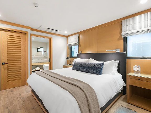 King sized fully outfitted with high quality linens and down comforter for a dreamy sleep