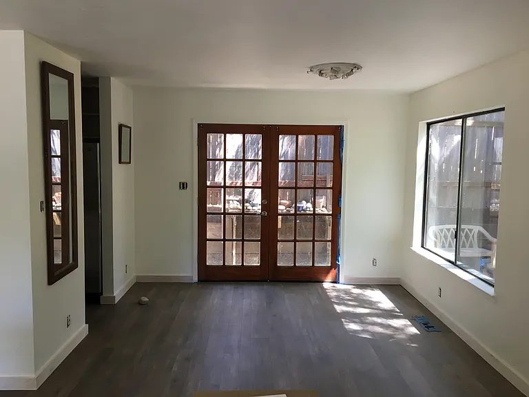 East entrance and dining area. Kitchen is on the left