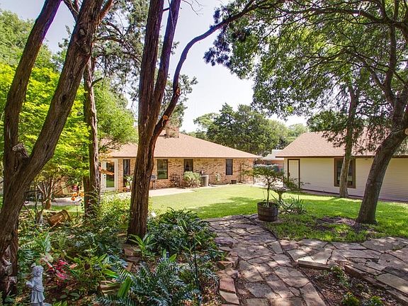 Enjoy the shade from the mature trees. Perfect for entertaining, play, or simply relaxing