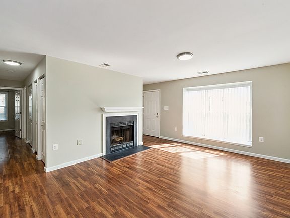 Living room w/wood burning fireplace