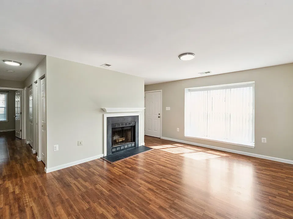 Living room w/wood burning fireplace