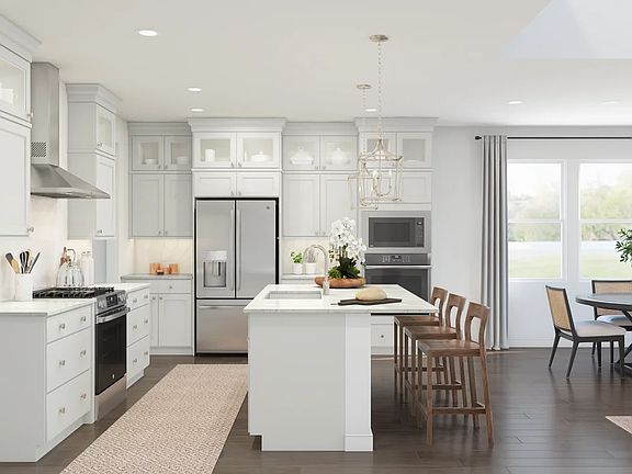 Kitchen with pendant lighting and gorgeous wood flooring