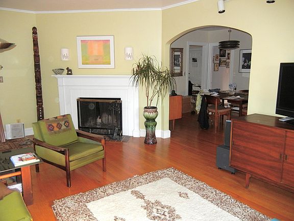 Living room with view of dining room