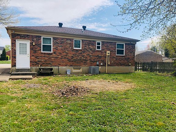 Backyard with wooded area behind for privacy