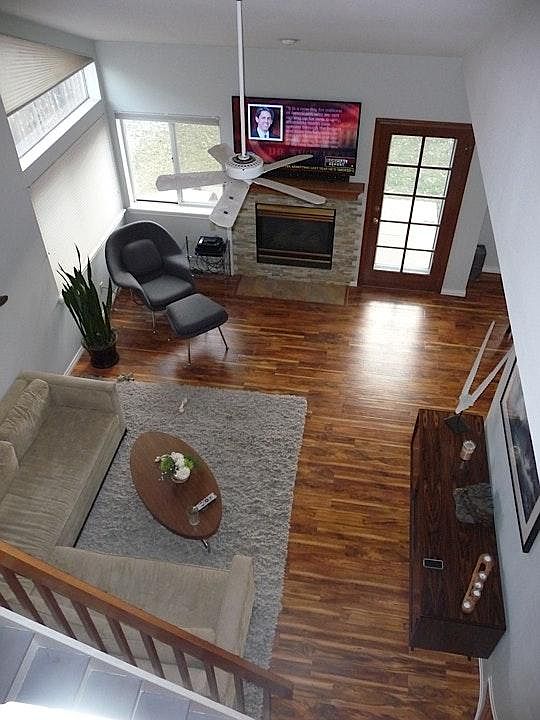 Sunny Living Room w/ Vaulted Ceilings