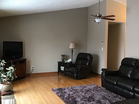 Living room w/ skylight