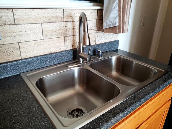 kitchen sink with new faucet