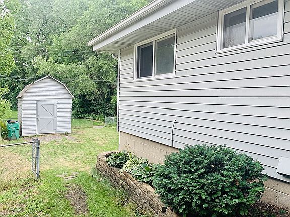 Sideyard looking to backyard