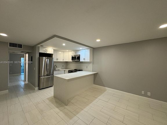 2nd image of 500 Village Green Cir W APT 215