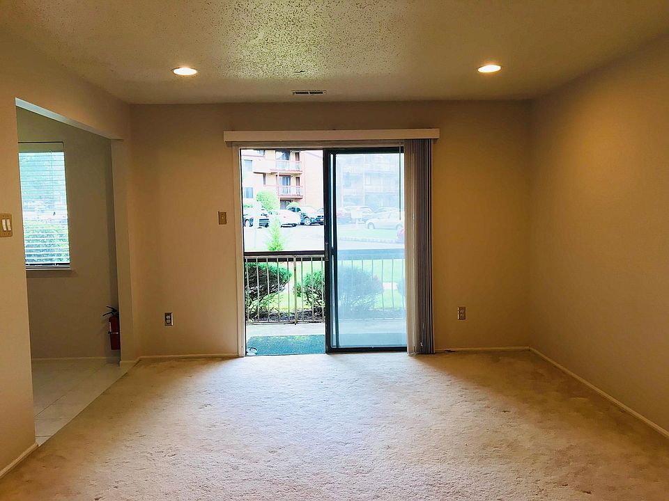 Spacious living room opens into patio/balcony