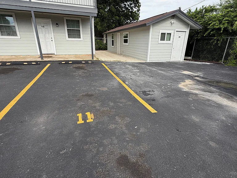 Dedicated parking - fits two cars bumper to bumper