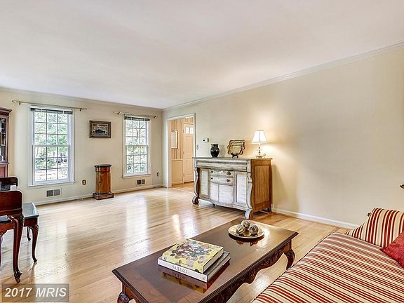 Light-Filled Living Room with Lovely Hardwood Fls.
