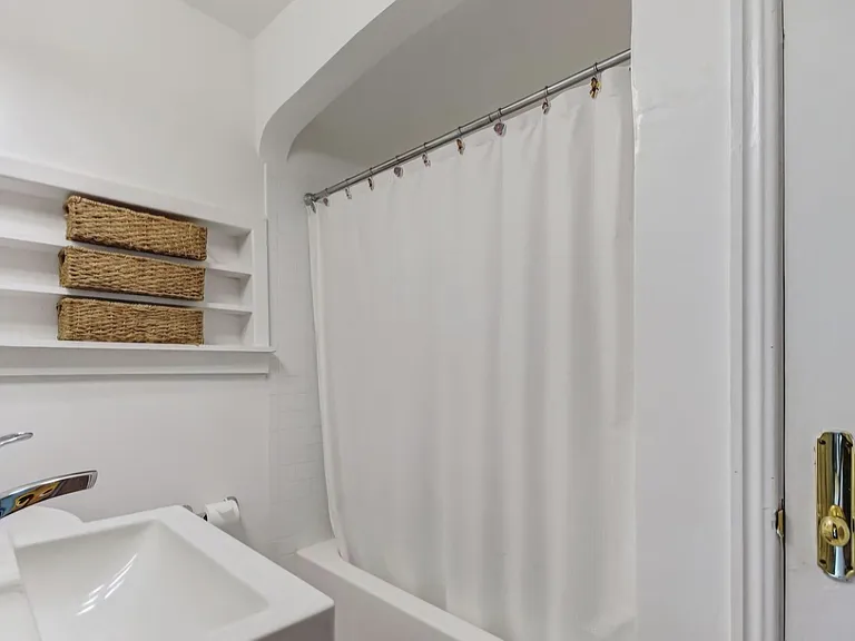 Master bathroom shower/tub with some built in shelving
