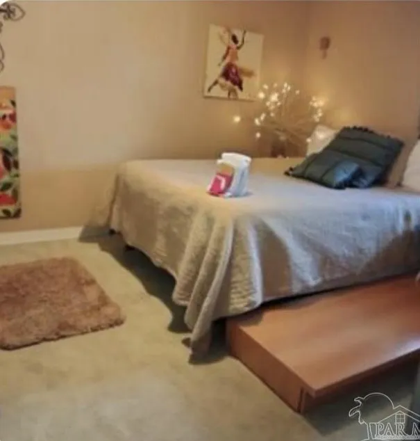 This liockable Bedroom has a 10 cubic fridge- above freezer, coffee center, plates, silverware, etc. - 909 W Lloyd St #1