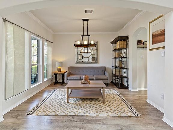 Formal dining near entry, currently being used as sitting area