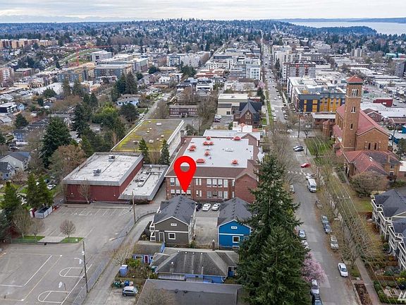 Stylish corner unit situated back away from the street. 