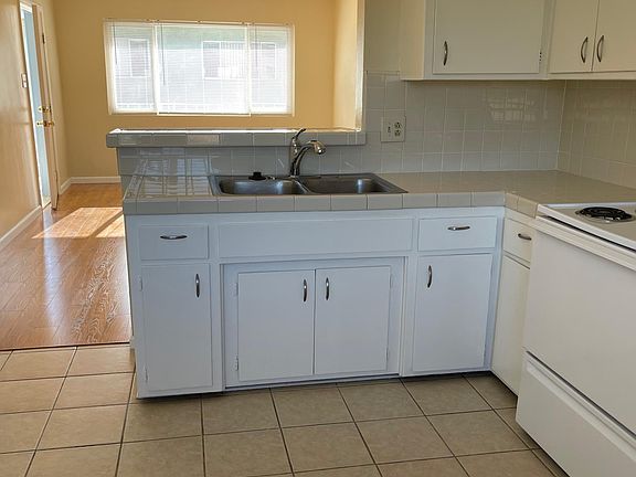Kitchen Overlooks Living Room