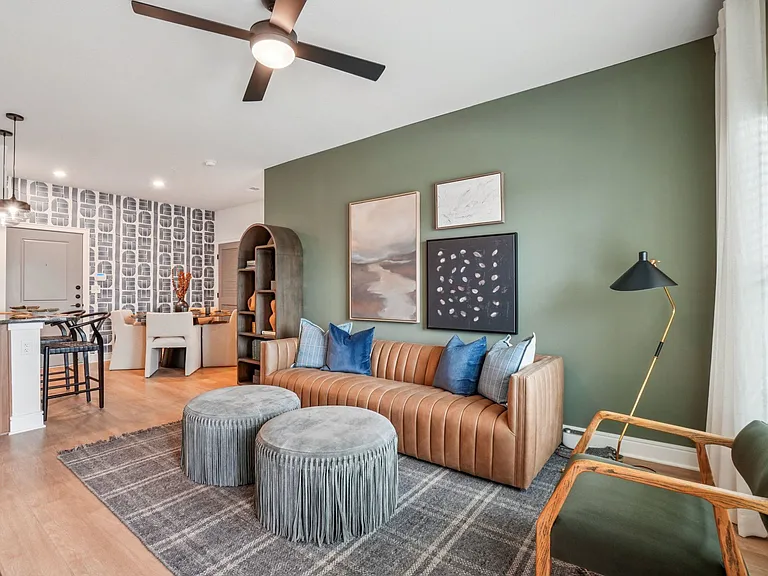 Kitchen Peninsula with Seating Space and View into Living Room