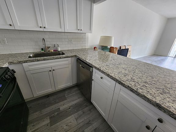 2nd image of 100 Edgewater Dr APT 323