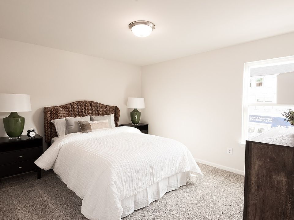 Two secondary bedrooms round out the upstairs.