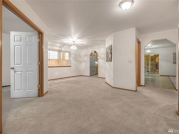View of the entry with the downstairs office with frenchdoors to the left
