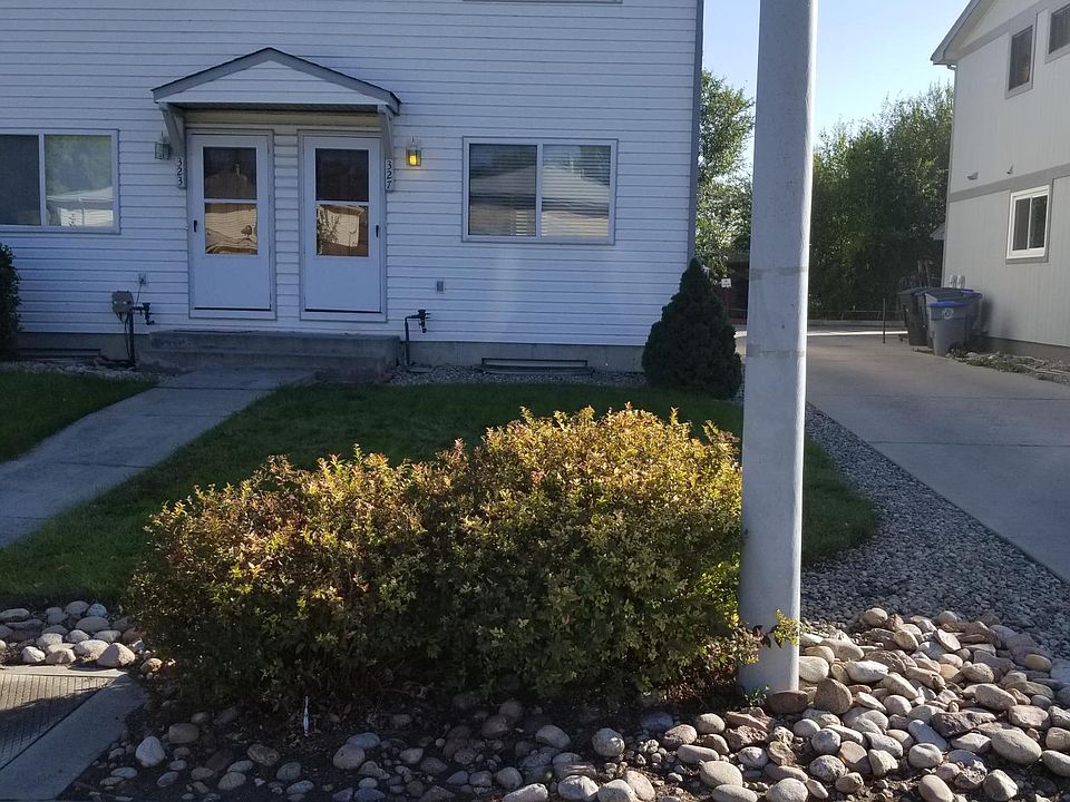 End unit with landscaped front yard