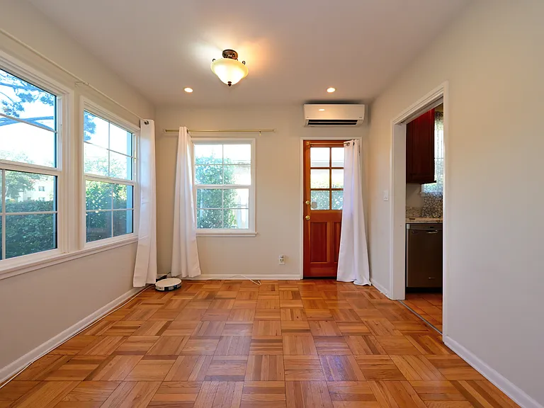 fully upgraded and bright w/ parquet hardwood flooring + mini split hvac + in-unit laundry