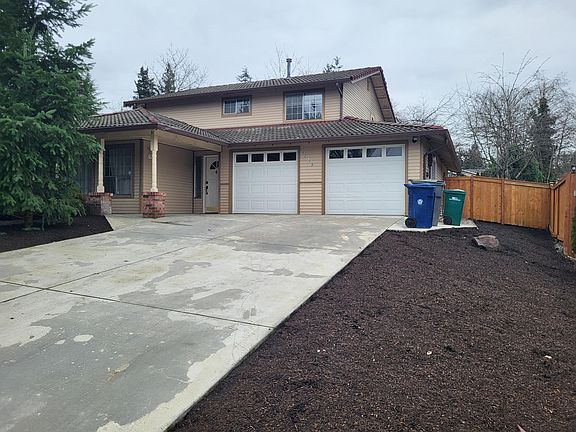 2 car garage, 2 story, 4 bed, 2.5 baths, one bedroom on main floor and three bedrooms up including primary bedroom