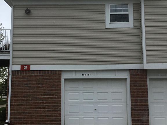 Side (Garage & additional parking space)