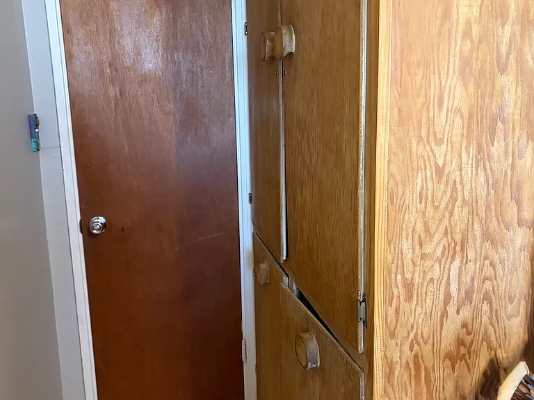 Huge storage cabinet in main bathroom