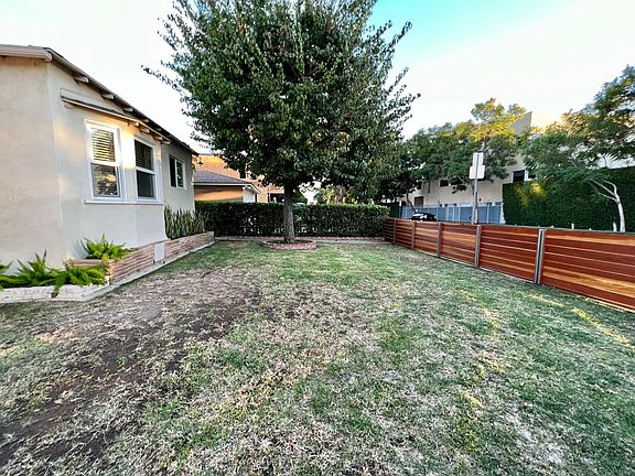 fenced, enclosed grassy area