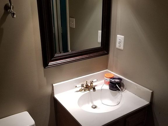 MAIN ENTRANCE 1/2 BATH RCENTLY REDECORATED WITH BRAND NEW COMODE AND WASH BASIN