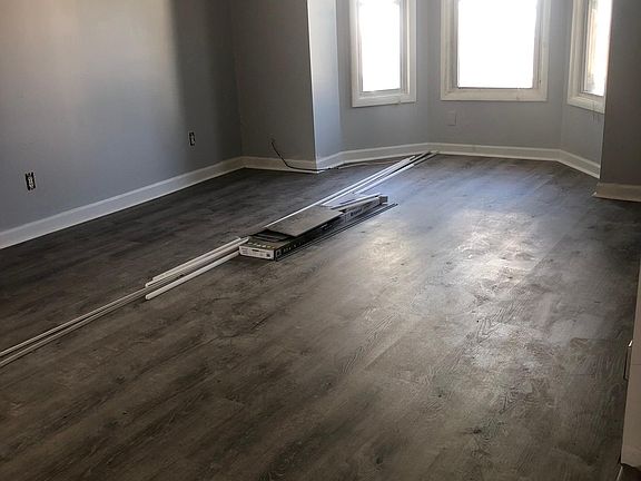 Living/dining room: newly painted and new flooring.