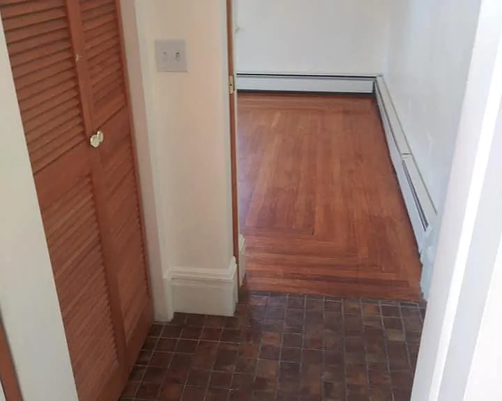 Hallway entering bedroom with hall closet