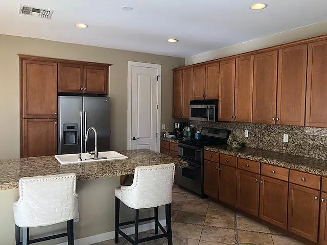 Kitchen with eat in bar