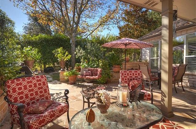 A Patio Paradise makes this Sun City Texas Travis Premier Home feel like you are on a year-around vacation!