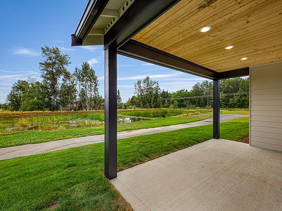 Covered patio at the back of home