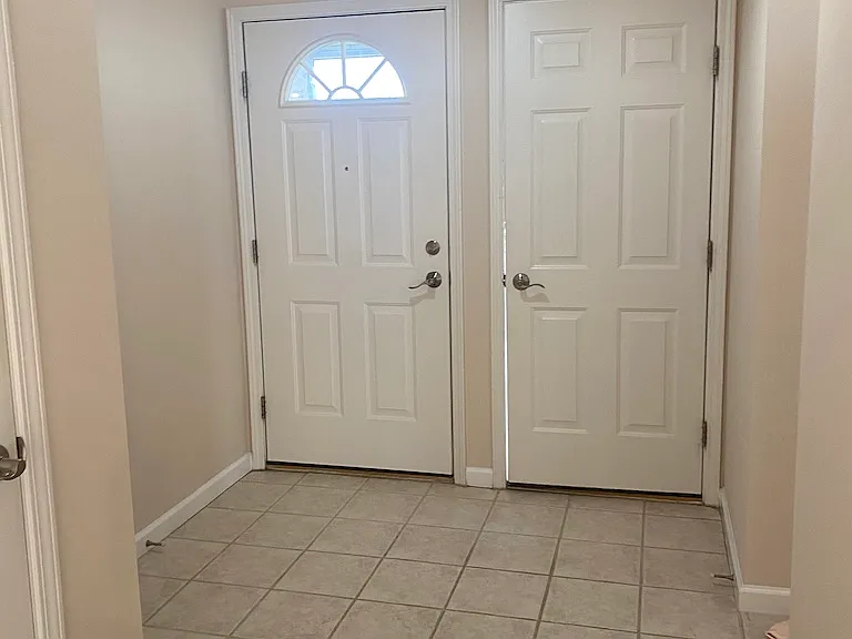 front door and door to garage
