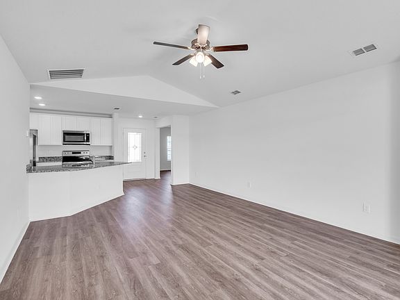 The Sunnyside s family room offers the perfect place to create memories with your friends and family