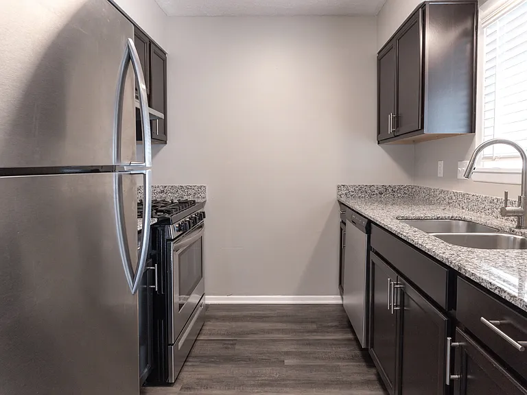 Kitchen in the Two Bedroom Townhome at Woodbridge Bloomington