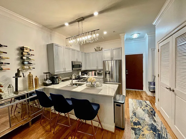Kitchen Island w/ Space for 3 Bar Stools.