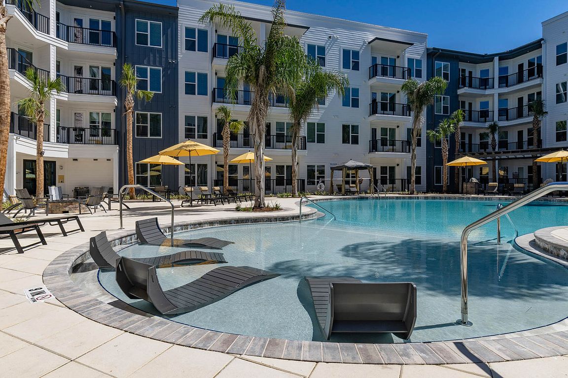 Relax by the poolside at this stunning, modern apartment complex.