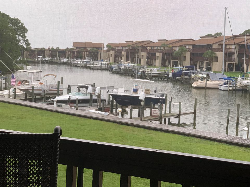 Boat lift is with blue boat.