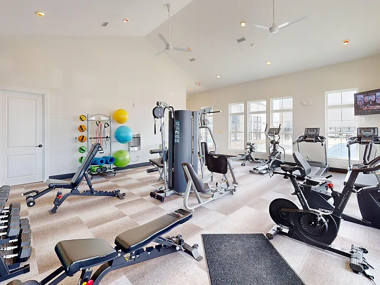 Treadmills, a spin bike, rowing machine, and free weights. This fitness center covers all the bases without the gym crowd.