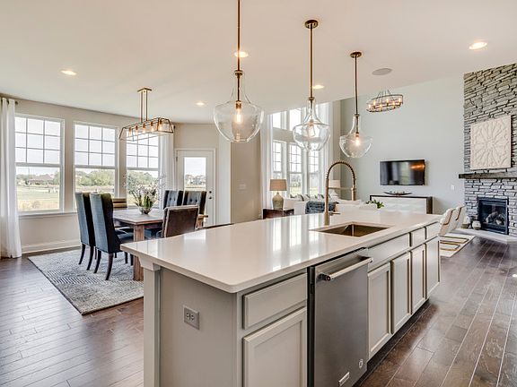 Open Concept Layout Featuring the Kitchen, Cafe and Gathering Room