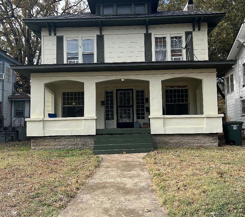 Front of house. Top two apartment tenants access house from a side entrance.