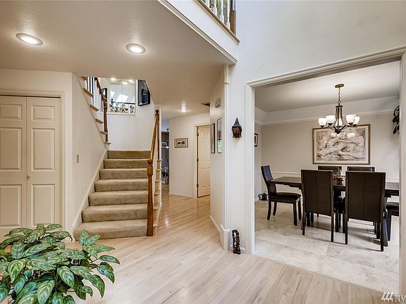 Enter to high ceilings, formal living room and dining room