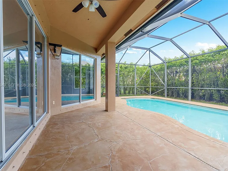 10635 NW 61st Ct — Photo 49