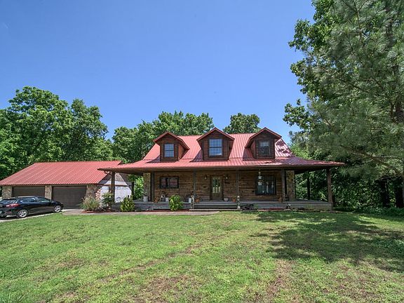 LOG CABIN IN THE WOODS
