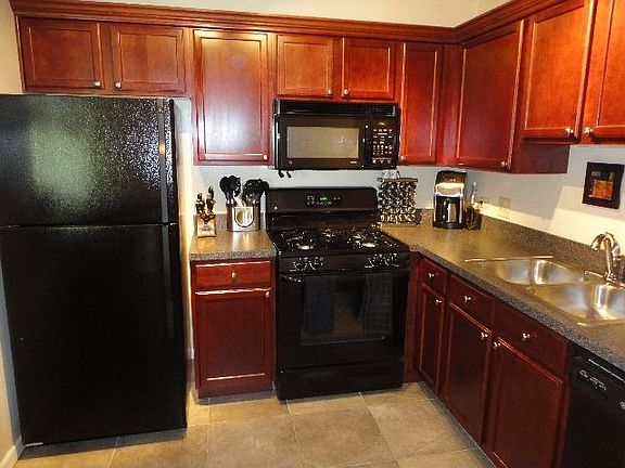 Beautiful Updated Kitchen with Cherry Cabinets!